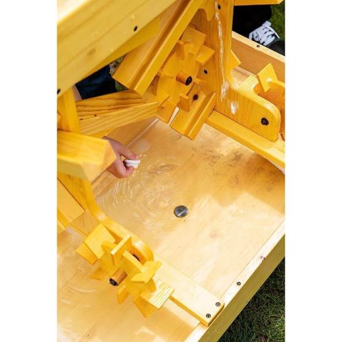 AvenlurOutdoorWoodenWaterTableForKids ToddlersTopViewUpCloseHoldingAPlug