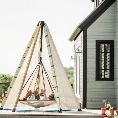 Bijou Nest with Guy relaxinG on a deck