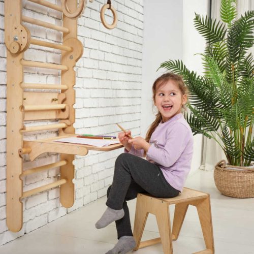 Goodevas5in1 WoodenSwedishWallBarSetforChildrenwithagirlusingthedesk min 1