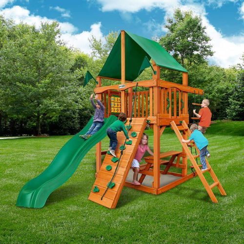 Gorilla Playsets Chateau Tower Outdoor Playset Deluxe Green Vinyl Canopy Showing Kids Playing