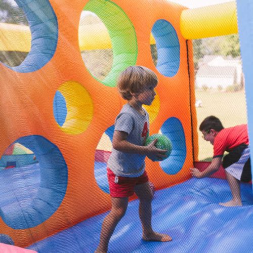 Jump nDodgeballSportsGame InflatableBounceHouse insideplaying 1