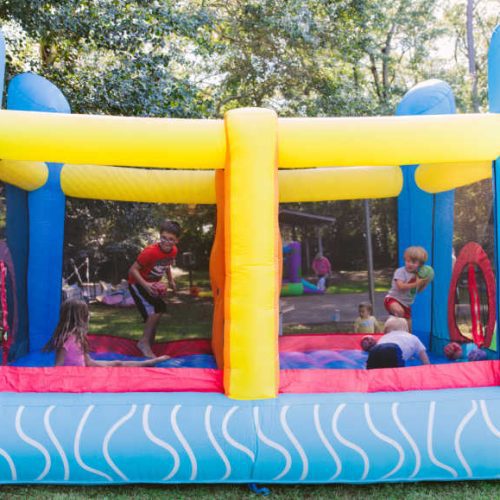 Jump nDodgeballSportsGame InflatableBounceHouseSideviewwithkidsplayin 1 min