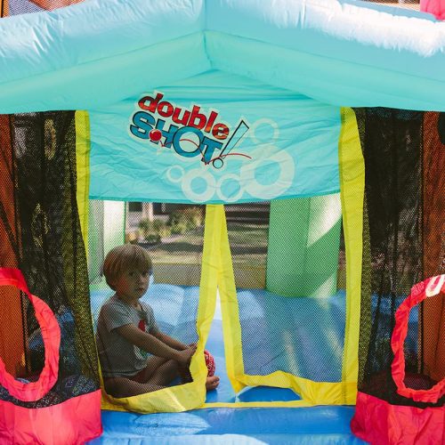 Kid Sitting Inside The Kid Wise Double Shot Bounce House