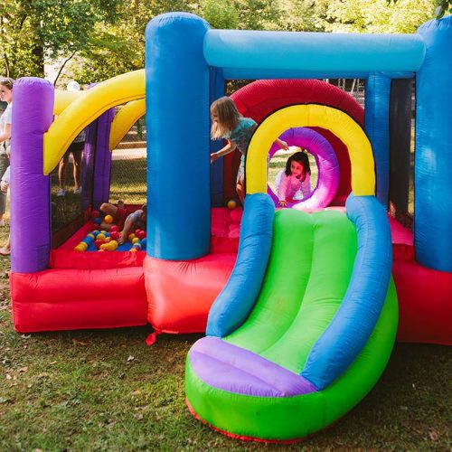 Kid Wise Lucky Rainbow Bounce House Kid Playing Inside