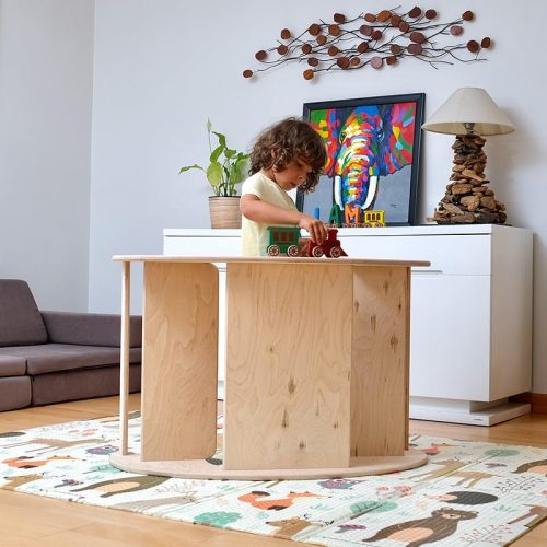 Kidodido2In1MontessoriWoodenSeesawandTableChairSetUseAsACountertopAKidPlayingWithWoodenVechicleToys