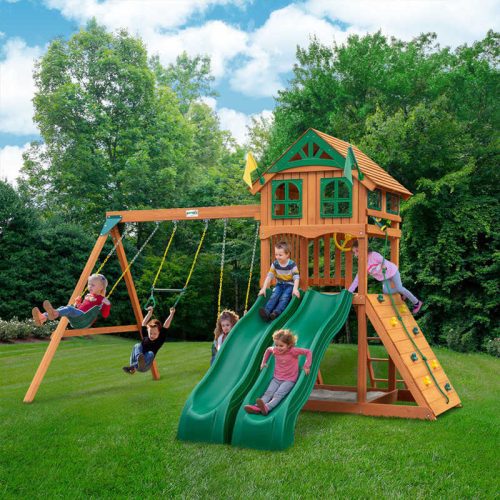 Outing with Dual slides Swing Set with kids playing and a wood roof.