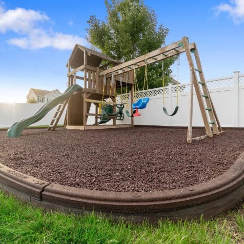 Playsafer Rubber Playground Mulch in Cocoa in a backyard