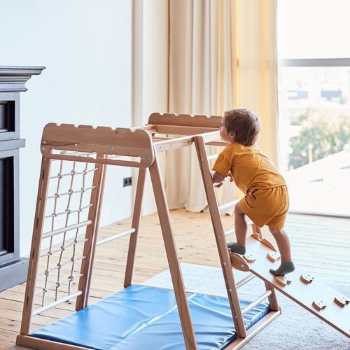 indoor_jungle_gym_boy_climbing_ladder