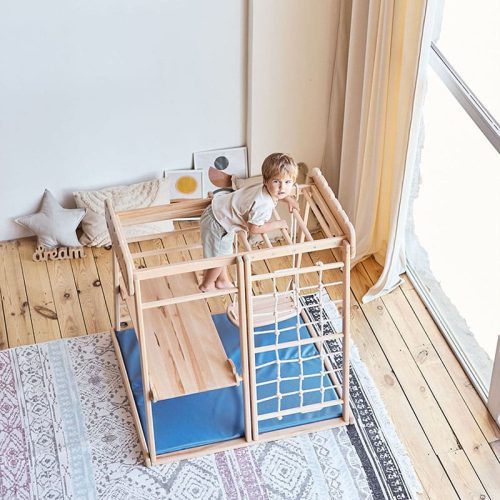 indoor jungle gym boy playing top view