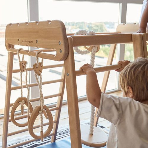 indoor jungle gym close up boy playing