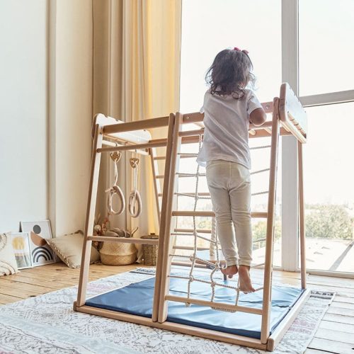 indoor jungle gym girl playing climbing