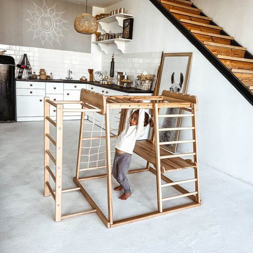 indoor jungle gym girl playing kitchen