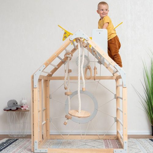 wooden climbing playhouse front view rope hanging boy playing