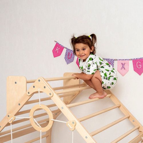 wooden climbing playhouse girl close up view on top