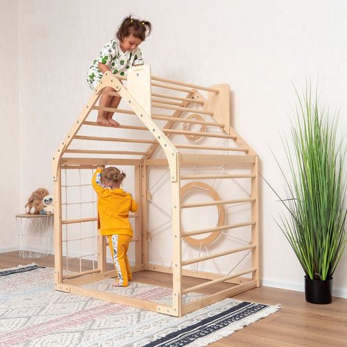 wooden climbing playhouse side view girls playing